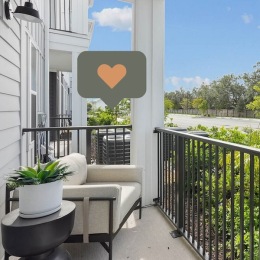a patio with a couch and table