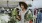 a person holding a bunch of broccoli