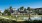 lake in front of building