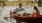 a man and woman in a canoe