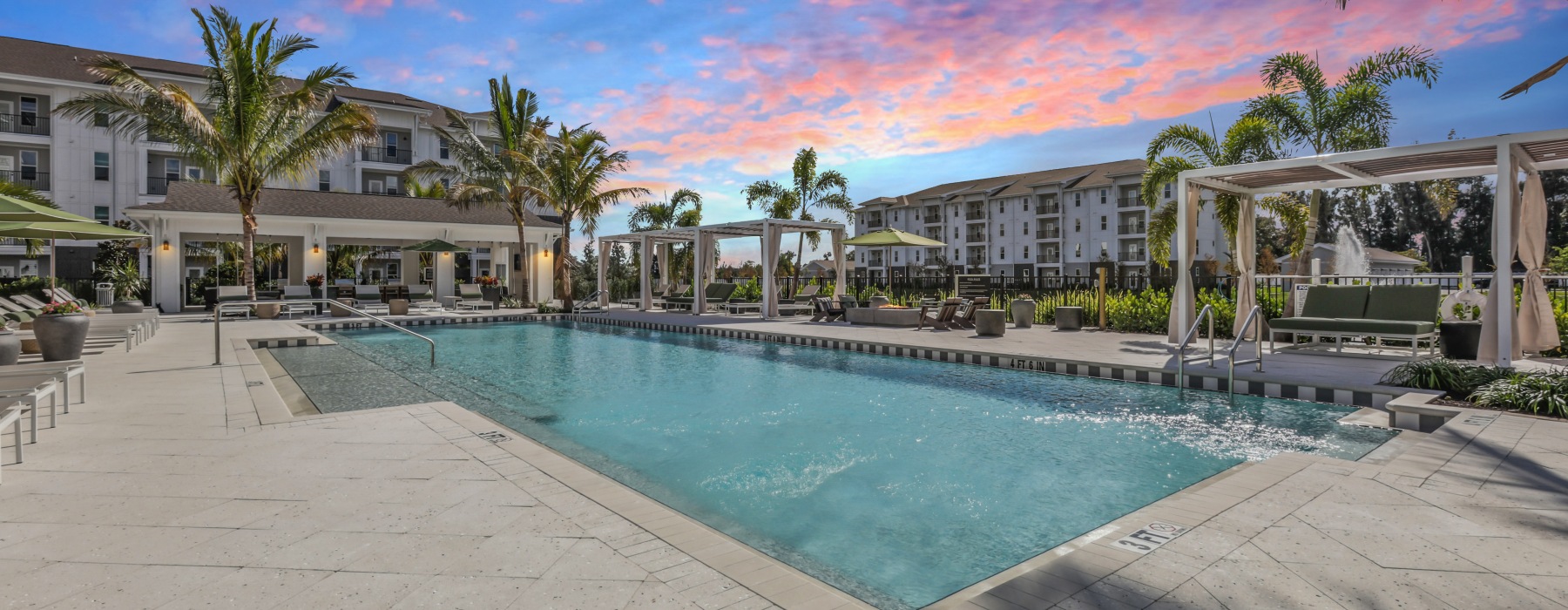 Swimming pool at sunset